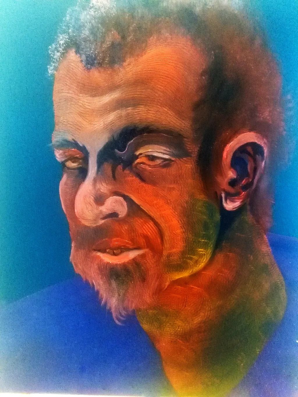 A portrait in red and orange